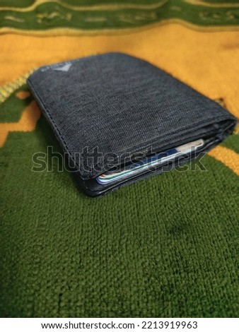 wallet lying on the carpet