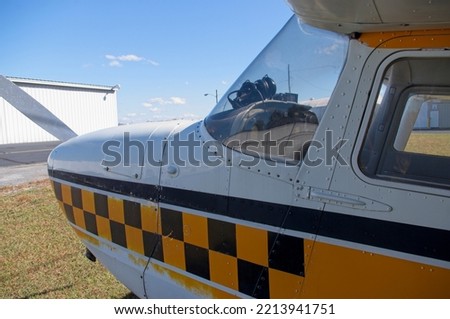 Front left section of high wing airplane Royalty-Free Stock Photo #2213941751