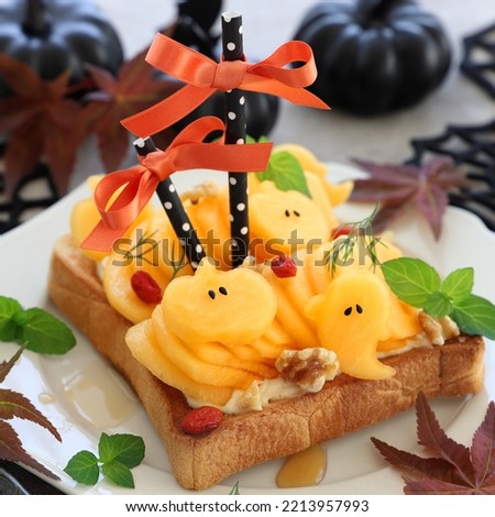 Halloween open sandwich with  fresh persimmon and cream cheese