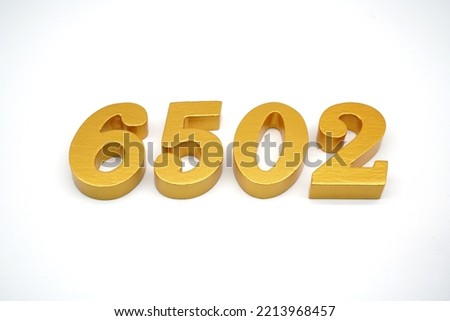     Number 6502 is made of gold-painted teak, 1 centimeter thick, placed on a white background to visualize it in 3D.                               