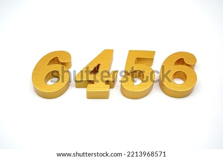     Number 6456 is made of gold-painted teak, 1 centimeter thick, placed on a white background to visualize it in 3D.                               