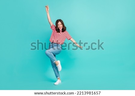 Full length photo of cheerful lovely cute lady eyes closed dancing empty space dressed trendy clothes isolated on cyan color background