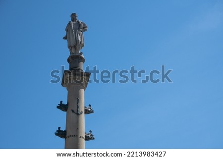 The Columbus Monument by Italian sculptor Gaetano Russo (1892) in Columbus Circle in New York City, seen against a blue sky Royalty-Free Stock Photo #2213983427