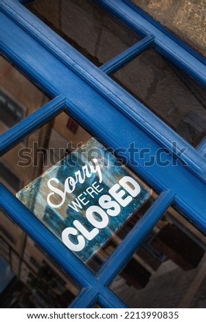 Closed sign on the door of a vintage shop
