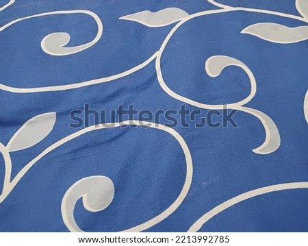 Batik pattern with blue base color.
