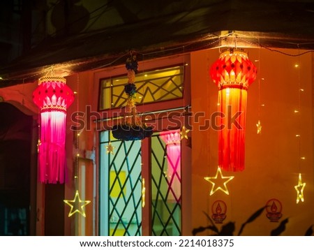 Diwali decorative lamps  or Akash Kandil or Lantern lights hanging outside traditional indian home or chawl in Mumbai Royalty-Free Stock Photo #2214018375
