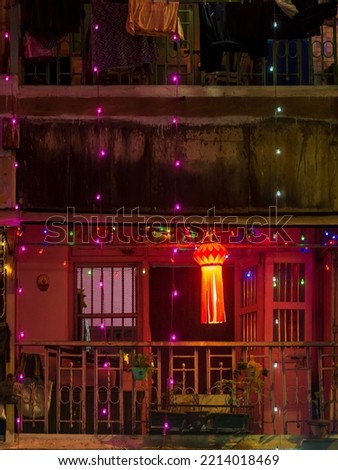 Diwali decorative lamps  or Akash Kandil or Lantern lights hanging outside traditional indian home or chawl in Mumbai Royalty-Free Stock Photo #2214018469