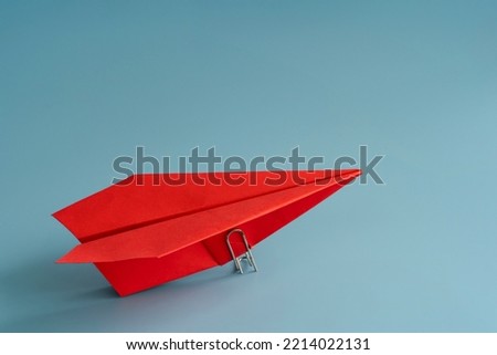 Ambition and goal concept with red paper plane on blue background. 3d rendering. Leadership and ambition concept