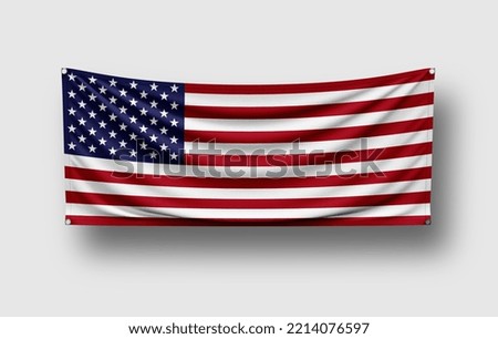 United States flag hangs on wall, white background