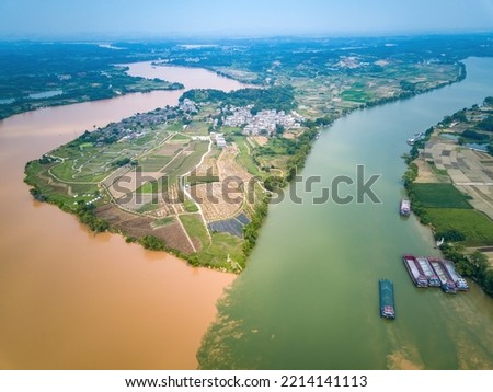 Sanjiangkou, Nanning, Guangxi, China, the dividing line where the two rivers meet Royalty-Free Stock Photo #2214141113