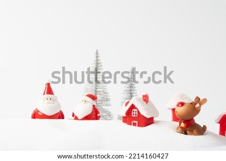 santa claus and reindeer with snow background