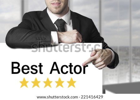 businessman pointing on sign best actor