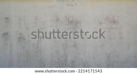 grey background plastered cement dirty and marked gray wall worn by time in header web panorama Royalty-Free Stock Photo #2214171543