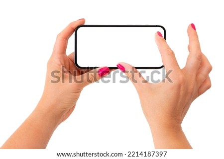 Mobile phone mockup. Person zooming something on the screen with both fingers. Royalty-Free Stock Photo #2214187397