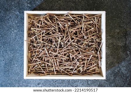 Photo of a large number of screws