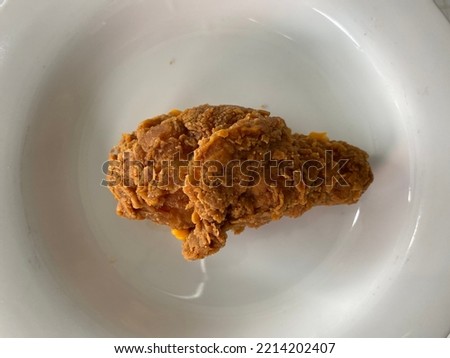 photo of a fried chicken.