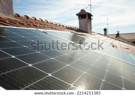 solar panels working at full capacity on a sunny day Royalty-Free Stock Photo #2214211385