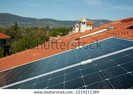 solar panels working at full capacity on a sunny day Royalty-Free Stock Photo #2214211389