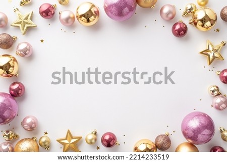New Year concept. Top view photo of stylish gold and pink baubles star ornaments and confetti on isolated white background with empty space in the middle