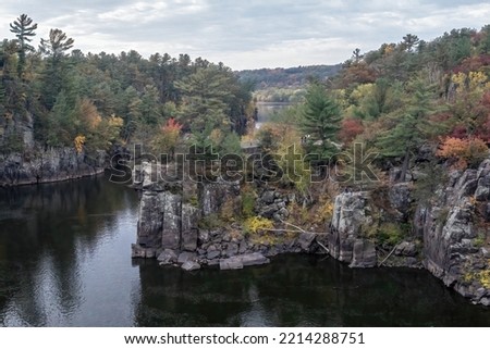 Scenic view of Angle Rock in Interstate State Park on the St. Croix River on an autumn day in Taylors Falls, Minnesota USA.