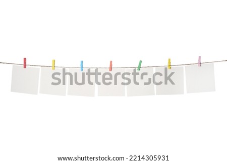 Clothespins with empty notepapers on string against white background. Space for text Royalty-Free Stock Photo #2214305931