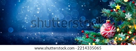Close-up Of Decorated Christmas Tree With Snowy Background - Christmas