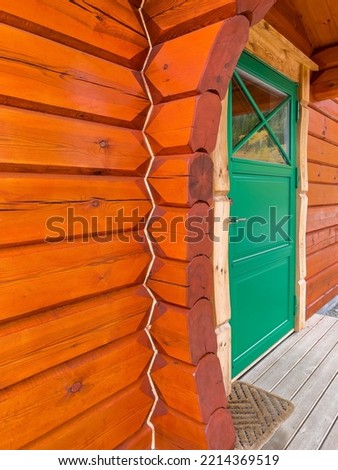 Front porch and entrance door, cottage style log, Norway