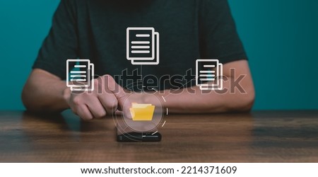 Man using mobile smartphone. Document management system (DMS), online documentation database and process automation to efficiently manage files.