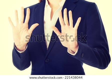 Business woman showing stop gesture.