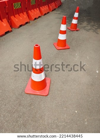 Orange traffic cone for marking and safety sign