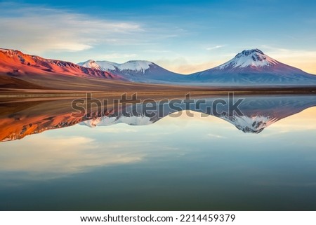 Idyllic Lake Lejia reflection and volcanic landscape in Atacama desert, Chile Royalty-Free Stock Photo #2214459379
