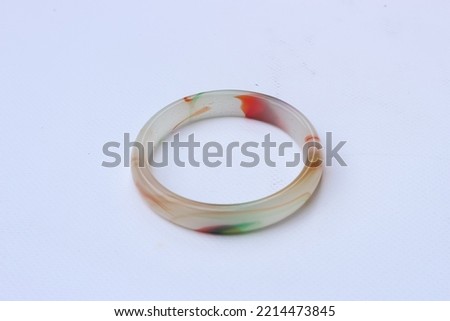 View of Women's accessories glass bracelet Isolated on white background, selective focuss blurry background 