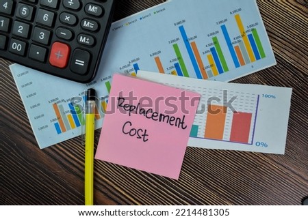 Concept of Replacement Cost write on sticky notes isolated on Wooden Table.