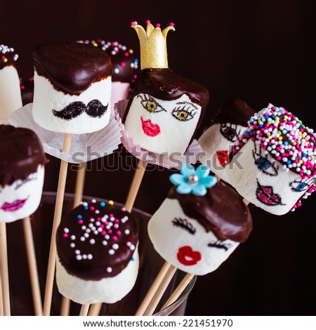 Funny marshmallow pops. Selective focus