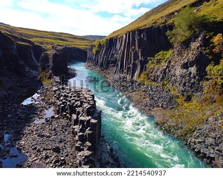 Studlagil Canyon basalt columns Iceland Royalty-Free Stock Photo #2214540937