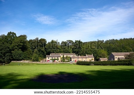 The small traditional rural village of Blanchland on a sunny autumn day in Northumberland on the border of County Durham, England, UK. Royalty-Free Stock Photo #2214555475