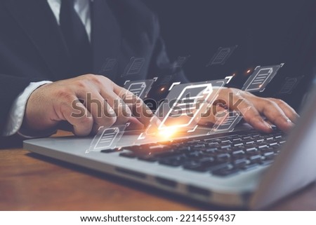 Hand with document icons and typing to laptop computer, Online documentation database and document management system concept. Process automation to efficiently manage files.