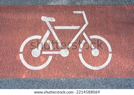Zoom on a bicycle drawing on the floor of a bike path