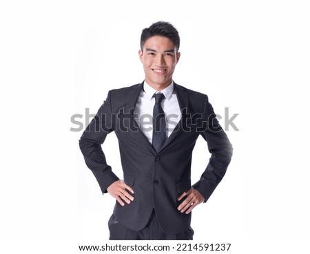 Handsome fashion model.
elegant man wear formal black suit with bow tie on white background

