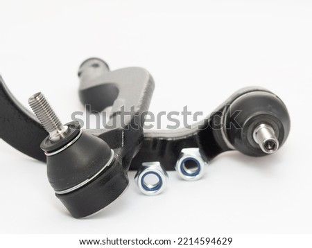 Car track rod end steering joint isolated against a white background. Spare part Royalty-Free Stock Photo #2214594629