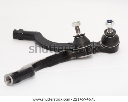 Car track rod end steering joint isolated against a white background. Spare part Royalty-Free Stock Photo #2214594675