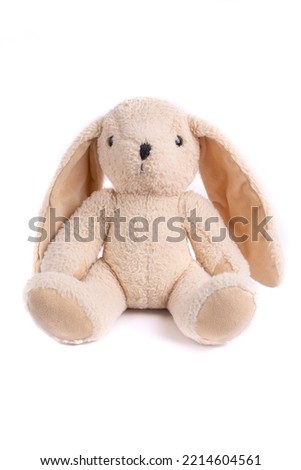 Plush bunny on a white background. Children's toy Royalty-Free Stock Photo #2214604561