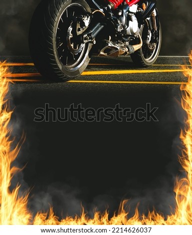 Motorbike and fire flames on vertical black frame background with copy space