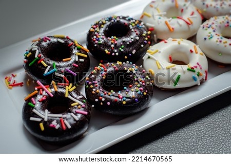 Different donuts Minimal concept.
black white or pink color Donut