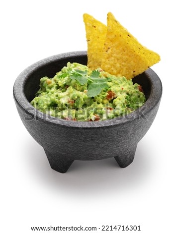homemade guacamole with tortilla chips, Mexican appetizer Royalty-Free Stock Photo #2214716301
