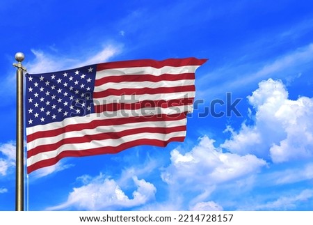 USA United States of America Flag Waving In The Wind On A Beautiful Summer Blue Sky
