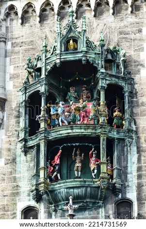 The Rathaus-Glockenspiel in Munich is a tourist attraction clock in Marienplatz, the heart of Munich, Germany Royalty-Free Stock Photo #2214731569