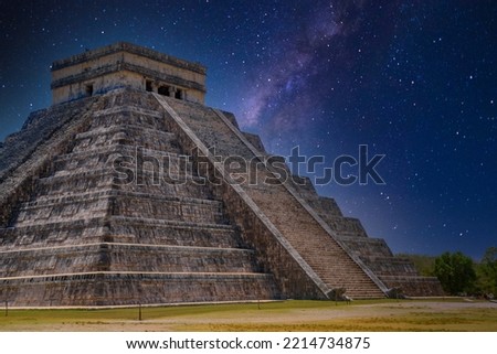 Temple Pyramid of Kukulcan El Castillo with Milky Way Galaxy stars night sky, Chichen Itza, Yucatan, Mexico, Maya civilization. Royalty-Free Stock Photo #2214734875