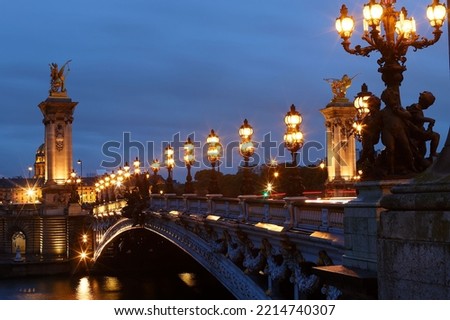 The famous Alexandre III bridge at rainy night, Paris, France