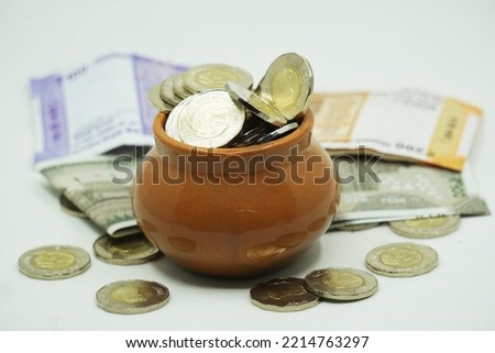 Pot full of coins indicating wealth
